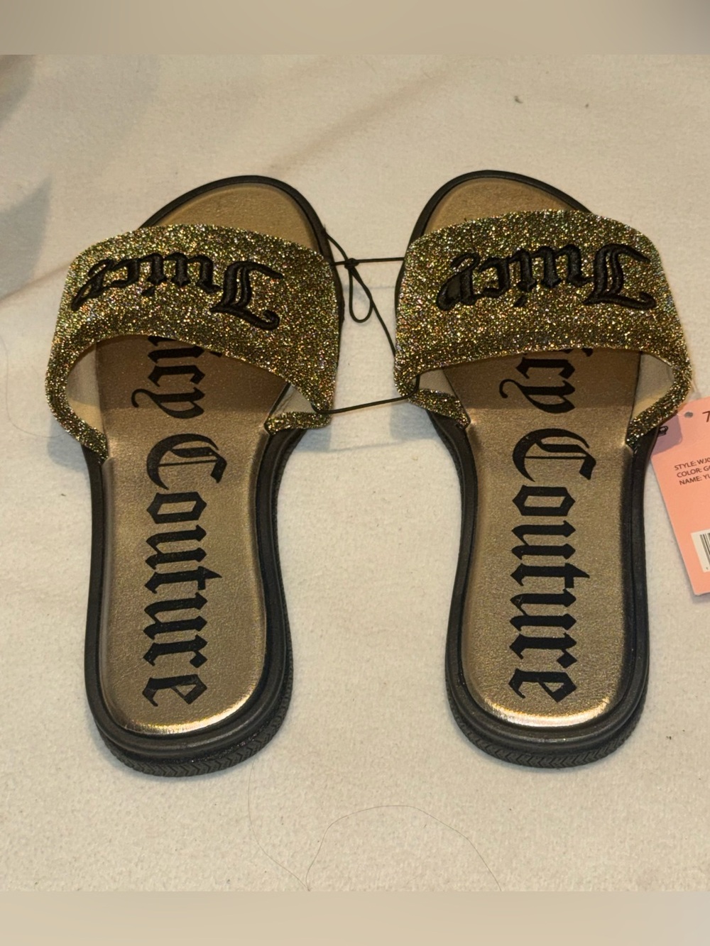 Juicy Couture Yuna Sandals in metallic gold, featuring a sparkly glitter upper